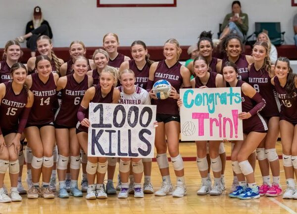 Chatfield volleyball takes a team picture to celebrate senior Trindy Barkeim (with ball) and her 1,000th career kill. The Gophers are 21-7 on the year and ranked #3 in Class AA.” Photo by Leif Erickson