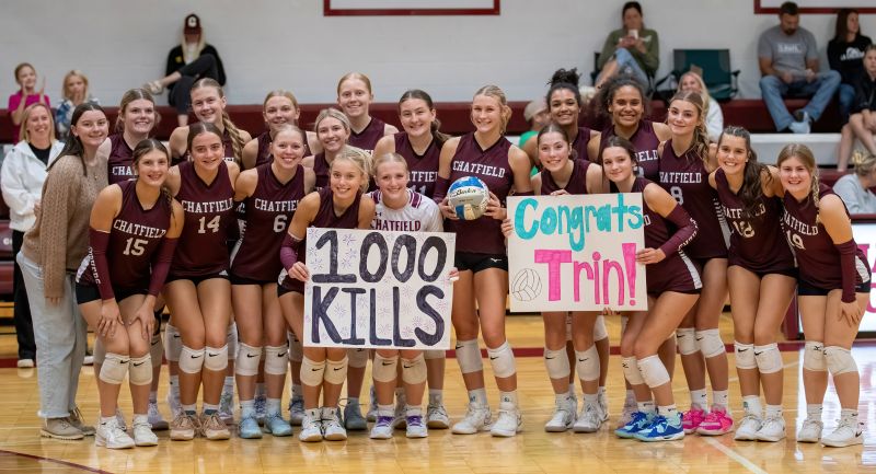 Chatfield volleyball takes a team picture to celebrate senior Trindy Barkeim (with ball) and her 1,000th career kill. The Gophers are 21-7 on the year and ranked #3 in Class AA.” Photo by Leif Erickson