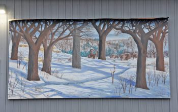 The mural on the Fest building in Spring Grove tells the story of winter in Minnesota’s first Norwegian settlement. Photo by Charlene Corson Selbee