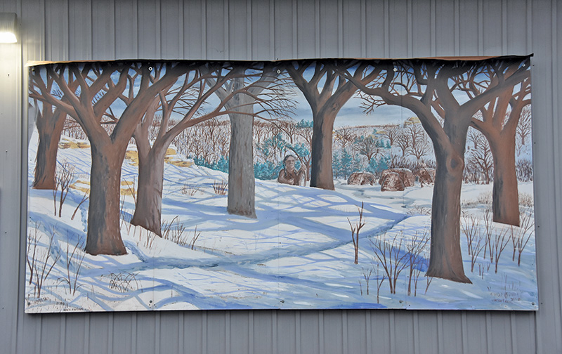 The mural on the Fest building in Spring Grove tells the story of winter in Minnesota’s first Norwegian settlement. Photo by Charlene Corson Selbee