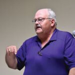 On the left, Minnesota Association of Townships (MAT) District 1 Director Rex Edge encouraged Houston County Township Officers Association dinner guests to attend Township Day at the Capitol in January and talk with their legislators about the importance of the townships. On the right, State Representative Greg Davids also spoke at the dinner. Photo by Charlene Corson Selbee
