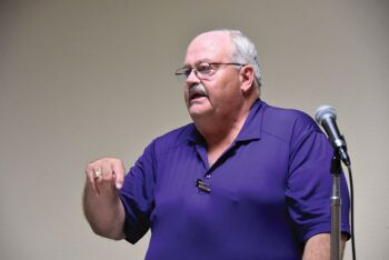 On the left, Minnesota Association of Townships (MAT) District 1 Director Rex Edge encouraged Houston County Township Officers Association dinner guests to attend Township Day at the Capitol in January and talk with their legislators about the importance of the townships. On the right, State Representative Greg Davids also spoke at the dinner. Photo by Charlene Corson Selbee