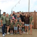 Steve and Karla Tart gathered with their children, their significant others, and all of their grandchildren for a picture on the patio at Rack's. Front row - Maverick Fenton, Hudson Fenton, Isaiah Tart, and Hayes Tart. Middle row - Cameron Fenton, Ashley Fenton, Lindsay Trende, Sutton Trende, Karla Tart, Mitchell Tart, Kylie Tart and Kenidy Fenton. Back row - Tyler Trende, Steve Tart and Romyn Tart. Photo by Jason Sethre