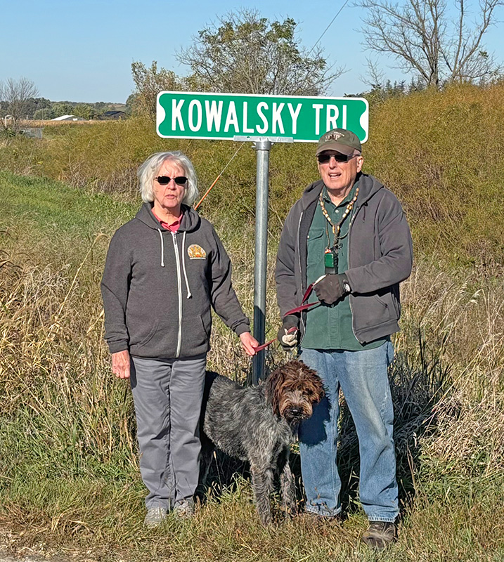 Mike and Linda Kowalski and their dog Pal. The Kowalskis were recognized for their ongoing efforts, with a road being named after them. Photo by Charlene Corson Selbee
