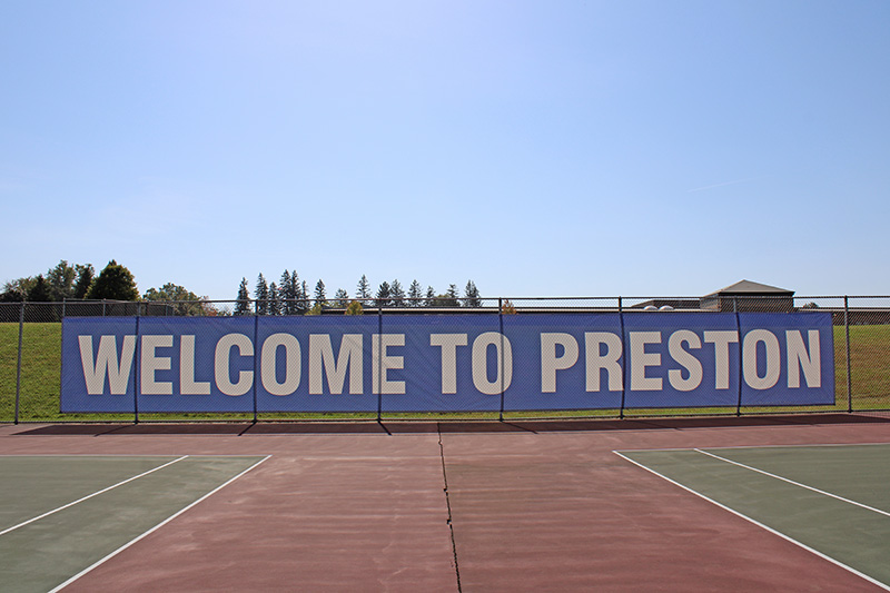 Measuring 65 feet wide, a massive “Welcome to Preston” banner was on display at the Preston tennis courts. Photo by Jason Sethre