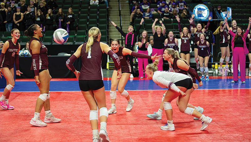 All of Chatfield volleyball - players, bench, and coaches, rejoice after the #4 Gophers swept #2 Albany 3-0 to move into the state finals match. Photo by Leif Erickson