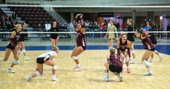 Chatfield volleyball players celebrate after Cora Bicknese (far right) put down the section championship clinching kill to beat Caledonia 3-1 (25-17, 25-22, 18-25, 25-20). The Gophers (24-7) repeat as 1AA champion. Photo by Leif Erickson