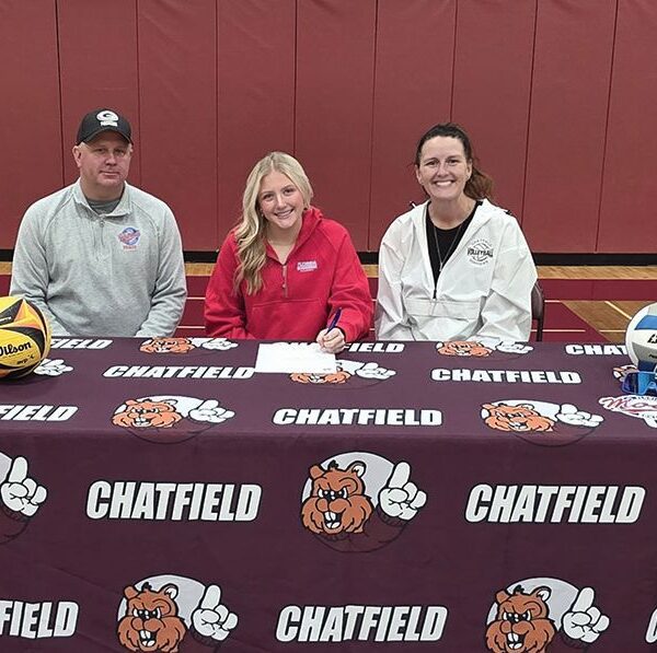 Chatfield’s Hannah Tweten recently signed a letter of intent to play college beach volleyball at Florida Southern College. She is pictured with dad Brent Tweten and Coach Kristi Rindels. Photo submitted