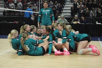 Fillmore Central volleyball celebrates repeating as Section 1A champion. The #4 in A Falcons romped through the section playoffs losing just one set including handily handling Alden-Conger (25-17, 25-9, 25-17) in the semifinals and #7 Kenyon-Wanamingo (25-19, 25-16, 25-12) in the finals. Photo by Paul Trende