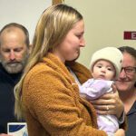 Mom Grace beams at her daughter Lilah Christiansen during the ambulance awards. In the background are Marty Momsen and Mimi Carlson. Photo by Wanda Hanson