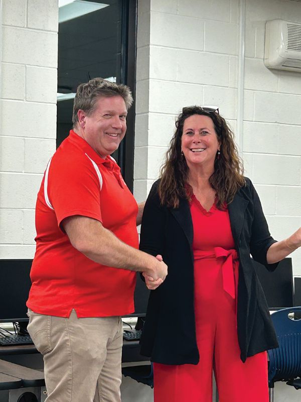 Tony Schultz, Hurricane Hero with Superintendent Mary Morem. Photo by Wanda Hanson