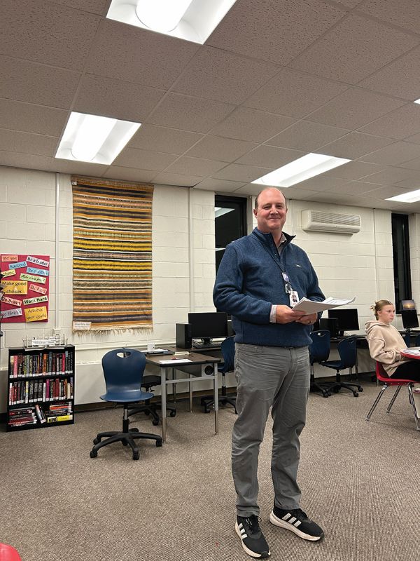 Michael Mangan, director of Educational Success and Innovation, explains course equivalency to the school board along with Kelsey Harvey who attended virtually. Photo by Wanda Hanson