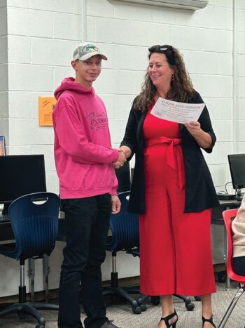 Chase Johnson, Hurricane Hero with Superintendent Mary Morem. Photo by Wanda Hanson