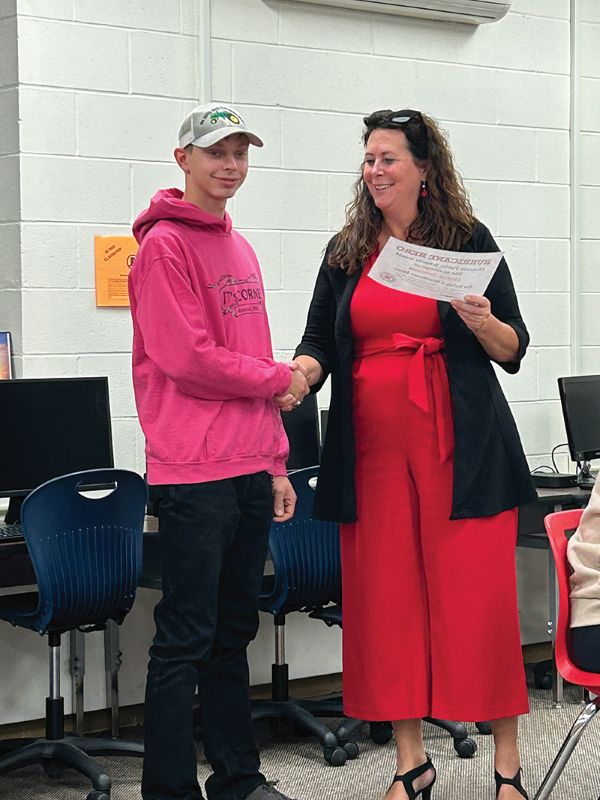 Chase Johnson, Hurricane Hero with Superintendent Mary Morem. Photo by Wanda Hanson