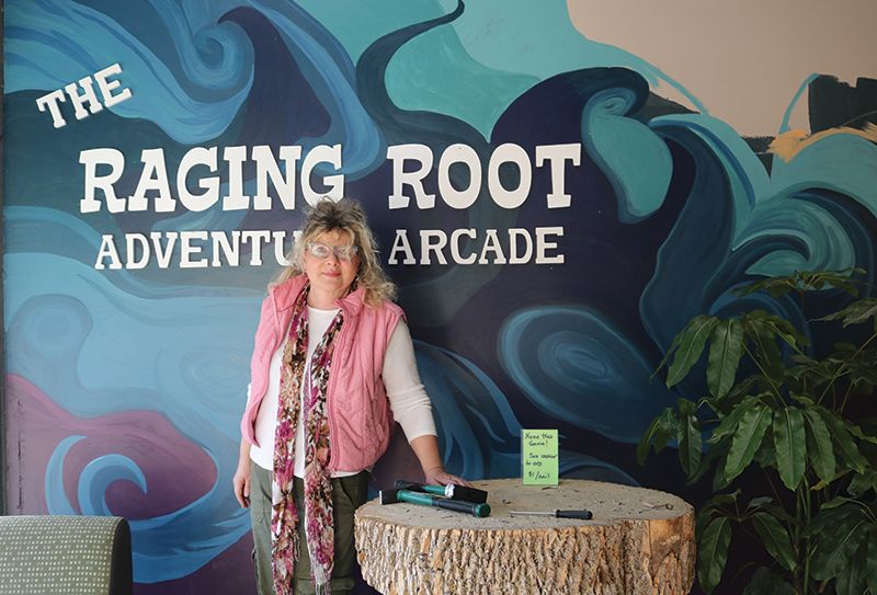 Kris Paxton, owner of The Raging Root Adventure Arcade and Axe Throwing in Lanesboro, Minn., is excited to open the doors and become a part of the Lanesboro community. Photo by Barb Jeffers
