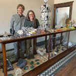 Aaron and Amy Bishop at the 12-foot display case filled with rocks of all kinds. Photo by Wanda Hanson