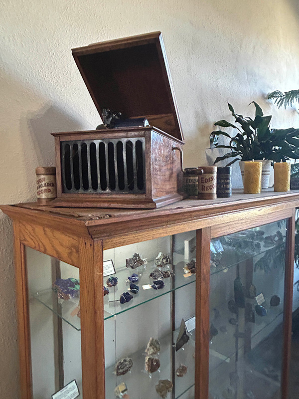 A wax cylinder player provides period music for the store. Photo by Wanda Hanson