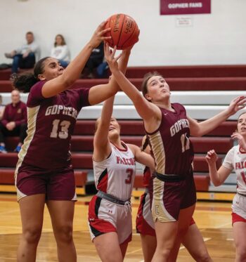 Chatfield’s Amaya Harmening (#13) and Julia Goldsmith (#11) have dibs on a rebound while Wabasha-Kellogg’s Eve Pavelka also is in the mix in the Gophers’ 58-51 TRC win, victory #1 for Chatfield. Photo by Leif Erickson