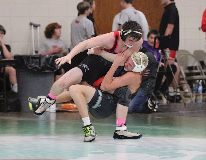 FCLMC’s Grant Daniels takes GMLOS’ Jaydence Ward to the mat as part of the Wolves wrestling quadrangular. Daniels won the above match by 12-2 major decision. Photo by Paul Trende