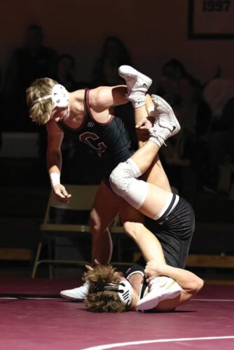 In a key match in LARP’s 39-36 upset of #2 Chatfield, 10th-ranked Christian Zibrowski of LARP (upside down) downed third-ranked Logan Pearson of Chatfield by 7-1 decision at 127. Photo by Sarah Sexton