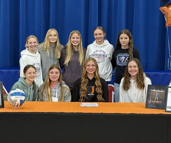 Mabel-Canton middle hitter Kinley Soiney has signed a letter of intent to play college volleyball at the University of Jamestown in North Dakota. The 2025 SEC Player for the Year, four-time All-SEC pick, three-time All-State pick, and Cougar all-time kill leader (2,205) is surrounded by her teammates. Photo by Heather Kleiboer