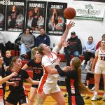 Lanesboro point guard Jensyn Storhoff drives, surrounded by four Spring Grove/Mabel-Canton defenders (from left), Carlie Halverson, Kylie Hammel, Lauren Hammel and Kinley Soiney. The Burros avenged a 2025 section play off loss with a key SEC victory, 61-52. Photo by Lee Epps