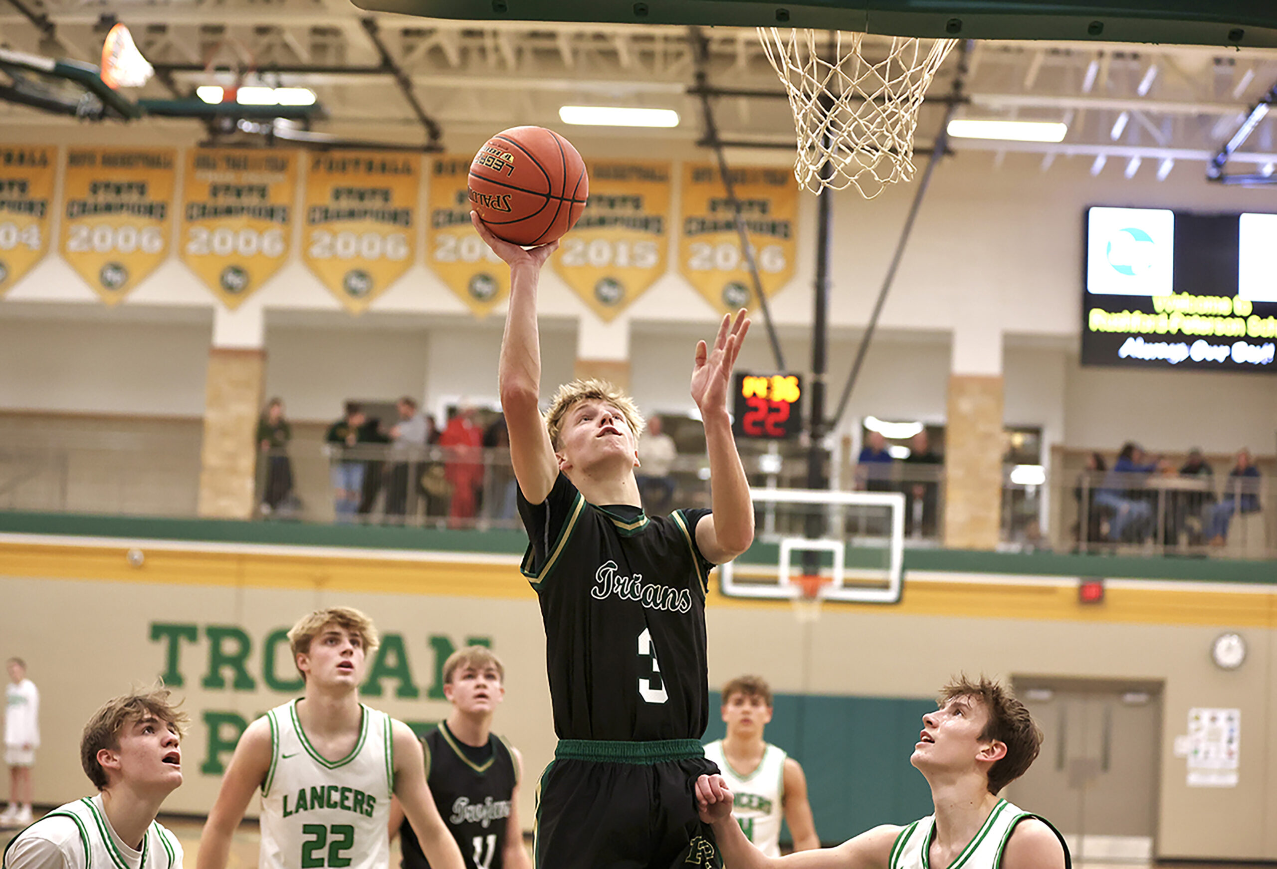 Rushford-Peterson senior Will LaFleur has the bunny opportunity in the Trojan’s 88-40 win over La Crescent/Hokah. R-P improved to 2-1 on the year. Photo by Craig Johnson