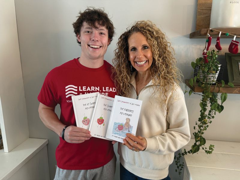 Mason and Nicole with their three published books, “The Ice Skating Adventure,” “The Shopping Adventure” and “The Paddling Adventure.” Photo submitted