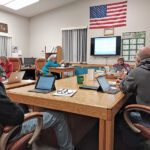 The Rushford Village Council deliberates on truck issues at the December 3 meeting. Pictured, clockwise from left: Councilor Bob Hart, City Attorney Joe O’Koren, City Treasurer Judy Graham, City Clerk Mary Miner, Zoning Administrator Jon Pettit, and Councilors Rick Ruberg and Mike Ebner. Photo by Kirsten Zoellner