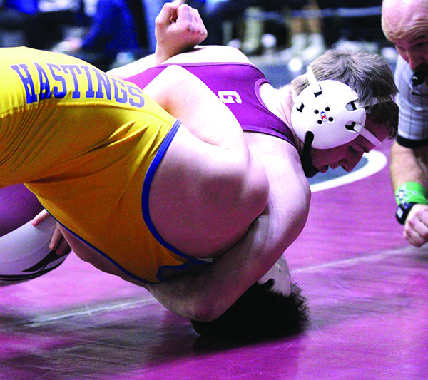 Chatfield’s Hunter Polikowsky has Hastings’ Rocco Iallonardo in deep trouble in a Bi-State consolation quarterfinal. Polikowsky won the match by 21-2 tech fall, went 6-2 for the tourney, and took fourth place overall of 60 at the 144-pound weight class. Photo by Paul Trende