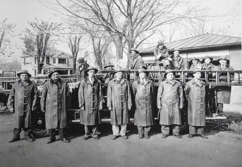 A firefighting crew and truck of the past. Photo courtesy of the Houston Public Library