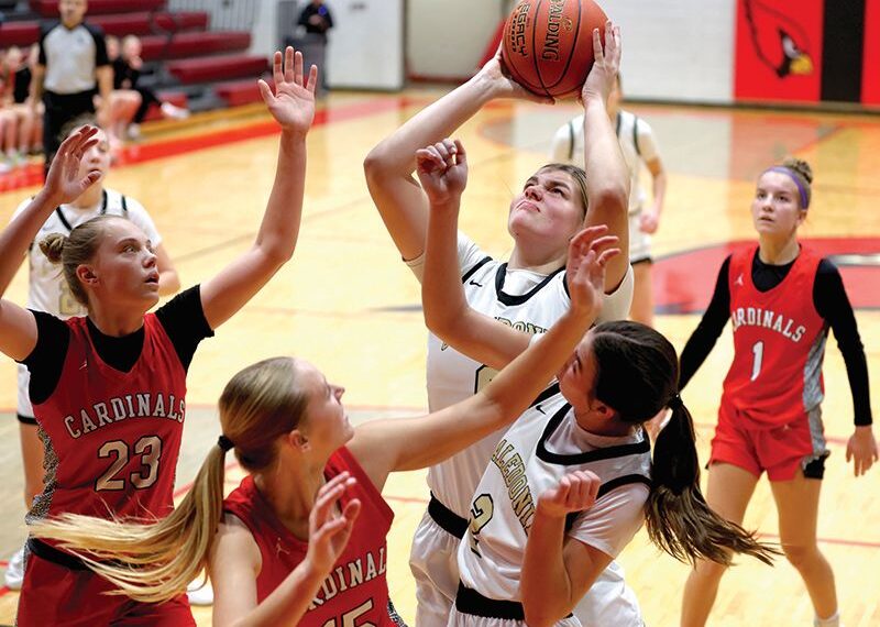 Caledonia’s Jessica Stendel battles inside against Lewiston-Altura’s Rinlee Bergan (#23) and Clara Kreidermacher (#15) in the Warriors 91-51 TRC win. The TRC-East leading Warriors (9-0, 12-3) have won five in a row. Photo by Craig Johnson