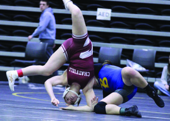 Chatfield’s Eve Goetzinger is upside down in a 165-pound semifinal versus Bonduel’s Alisha Berg. Goetzinger lost the match by fall but went 4-1 for the tourney to take a team-best third place of 29 competitors at her weight class. Photo by Paul Trende