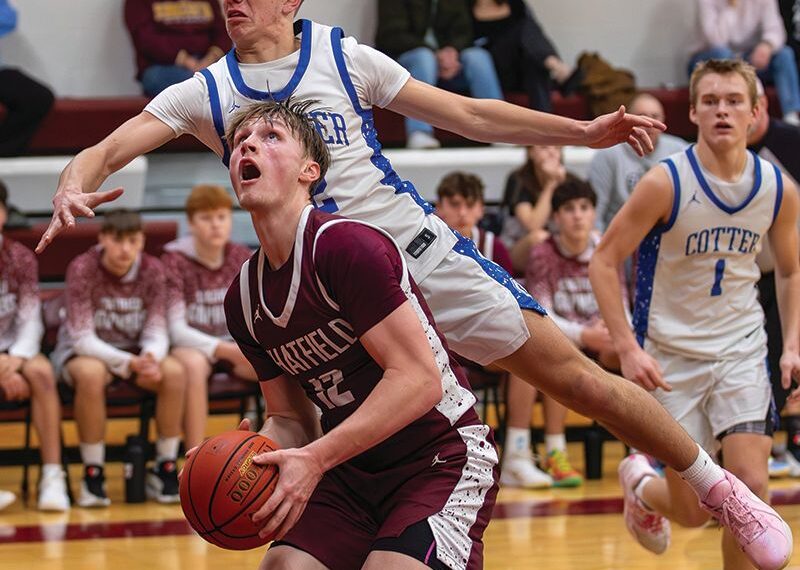 Chatfield’s Brooks Lea looks to elude Cotter/Hope Lutheran’s Lewis Shira in the teams’ notable TRC matchup. The Gophers beat the TRC-East leading Ramblers 67-57 and Albert Lea 77-57 to run their win streak to six. Photo by Leif Erickson