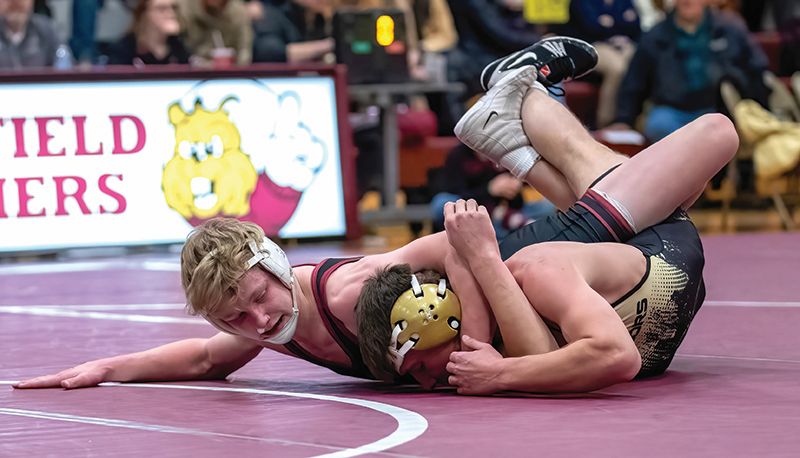 Chatfield’s Cody Ramaker has Caledonia/Houston’s Karsen Klug stretched out in a 152-pound match at a triangular in Chatfield. Ramaker took the bout by 9-3 decision and the Gophers swept the tri, beating Cal/Hou 49-17 and PEM 56-6 to improve to 4-1 in the TRC, 8-3 overall. Photo by Leif Erickson