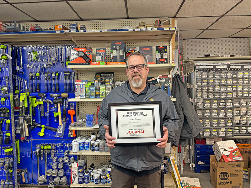 Mike Steien, owner-operator along with his wife Sylvia, stands behind the counter at their NAPA store in Preston, Minn. They have another location 15 miles up the road in Chatfield, Minn. Photo by Jason Sethre