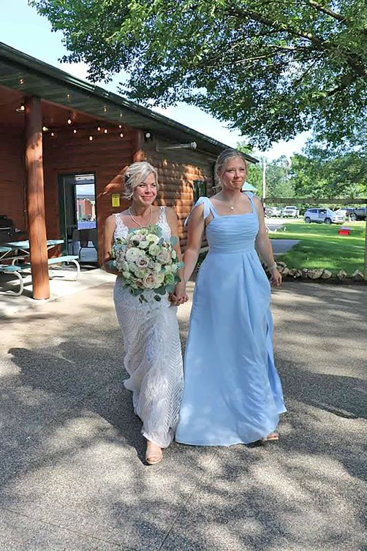 Mary Jo’s daughter Lydia walked her mom down the aisle. Photo by Salt and Pepper Photography
