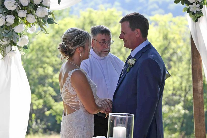 Pastor Kerry Eversole came out of retirement to perform the ceremony for Jon and Mary Jo’s wedding. Photo by Salt and Pepper Photography