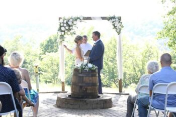 A beautiful natural background added to the beauty of the wedding. Photo by Salt and Pepper Photography