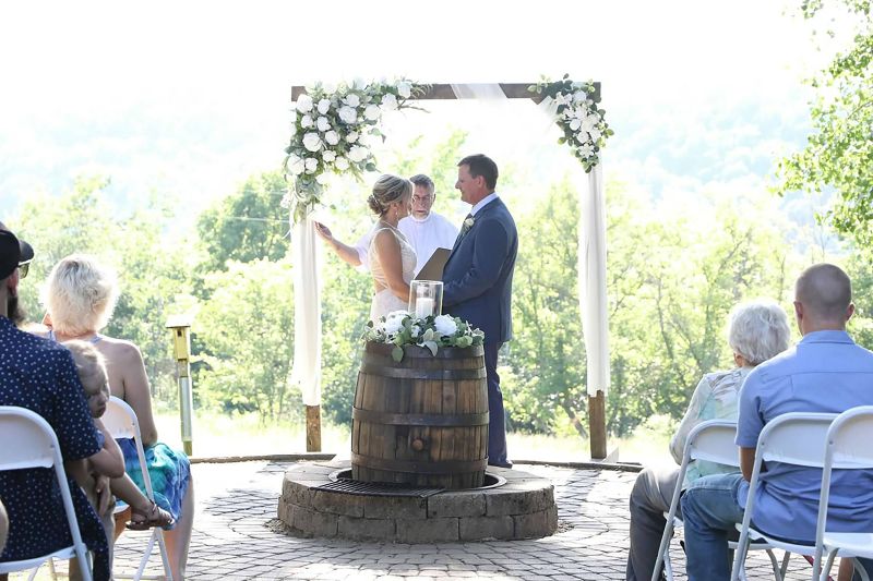 A beautiful natural background added to the beauty of the wedding. Photo by Salt and Pepper Photography