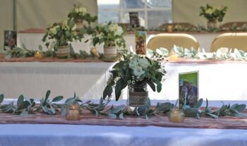 The welcoming tables are ready for the wedding guests to sit, eat and enjoy each other’s company. Photo by Salt and Pepper Photography