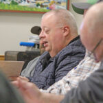 Village Councilor Travis Link (partially hidden), Mayor Dennis Overland, and Councilors Rick Ruberg (hidden) and Mike Ebner at the January 20 meeting. Photo by Kirsten Zoellner