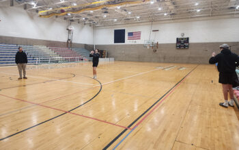 Youths play basketball inside the 100-by-100-foot gymnasium at Wykoff Commons, one of two full-size gym spaces available for recreation, practices and events. Photo by Zech Sindt