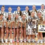 Caledonia girls basketball had a big week, beating Cotter/Hope Lutheran 77-55 to clinch a share of the TRC-East title and senior Aubrie Klug (holding sign) became the Warriors girls all-time leading scorer with over 1,761 career points and counting. The #10 in AA Warriors (15-3) have won eight in a row. Photo by Craig Johnson