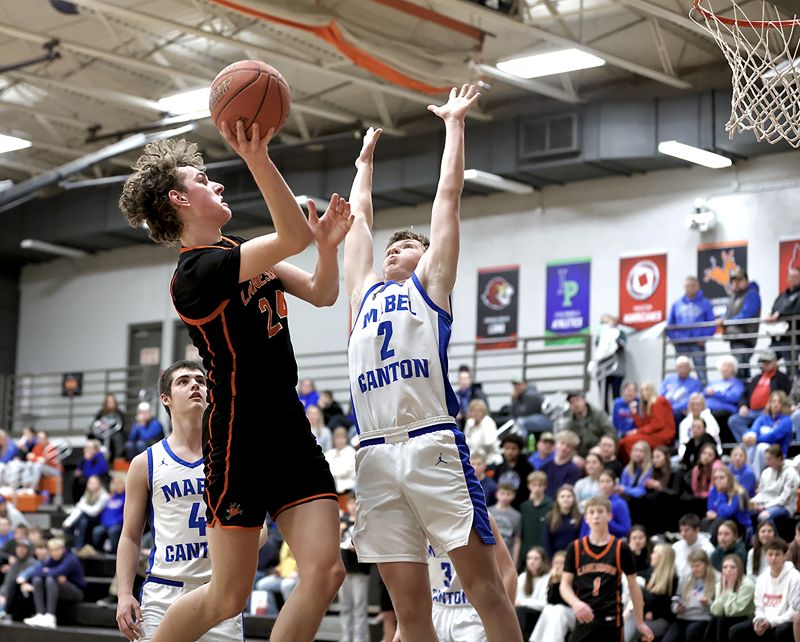 Mabel-Canton’s Brevyn Tollefsrud is focused to stop Lanesboro’s Nick Taylor, but the latter and his team are the ones locked in, knocking off Lewiston-Atltura 69-57 and the Cougars 60-42. The Burros (8-2, 14-3) continue to lead the SEC-East over nearest foe, the Cougars (7-4, 12-6). Photo by Craig Johnson