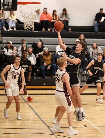 Chatfield’s Ryan Eickhoff looks to take the charge on Kingsland’s Caleb Rainey in the Gophers’ 105-42 win over the Knights. The Gophers (7-3, 12-7) won their ninth in 10 tries. Photo by Christine Vreeman