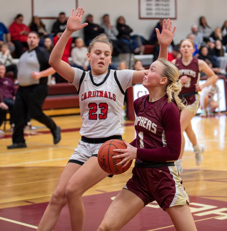 Chatfield’s Grace Schroeder takes the ball to the hoop versus Lewiston-Altura’s Rinlee Bergan in the Cardinals’ 70-58 win. The Gophers went 1-2 on the week, but the win saw Schroeder hit a game-winning three in the final five-second to beat PEM 55-54, and the senior guard has averaged 20.8 PPG across the Gophers final nine games. Photo by Leif Erickson