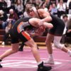 Chatfield’s Kaisen Johnson tangles early in his match with Farmington’s Austin Mitchell at the Gophers’ Saturday Quad. Johnson went 5-0 on the week, and Chatfield went 4-1, only losing to #1 in D-I Holmen by 29-23 tally. Photo by Paul Trende