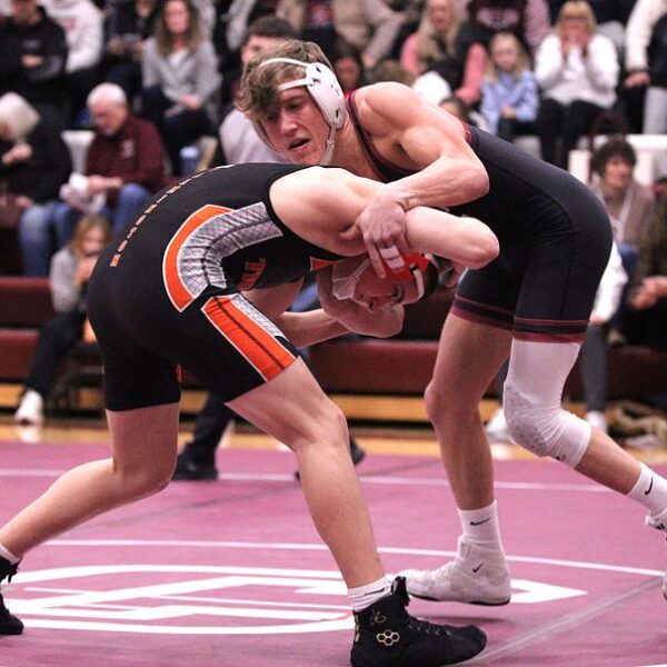 Chatfield’s Kaisen Johnson tangles early in his match with Farmington’s Austin Mitchell at the Gophers’ Saturday Quad. Johnson went 5-0 on the week, and Chatfield went 4-1, only losing to #1 in D-I Holmen by 29-23 tally. Photo by Paul Trende