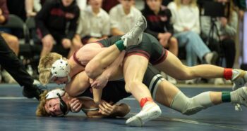 In a matchup at 127-pounds, Chatfield’s Logan Pearson has top position on LARP’s Christian Zibrowski en route to an 18-4 major decision, part of the Gophers’ 48-23 section semifinal win. Zibrowski beat Pearson 7-1 in the teams’ regular season meeting, a Screamin’ Eagle team win. Photo by Leif Erickson